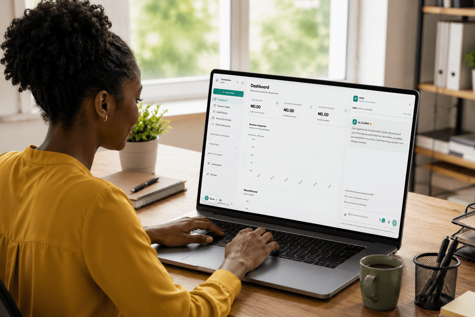 An accountant chats with DIAA inside the Books dashboard on her laptop